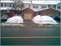 After several complaints, the City finally gets rid of the snow banks before someone gets killed! Until the next time!...